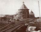 Остров Соловецкий более 80 лет назад. Фотография узкоколейной железной дороги на фоне монастыря.